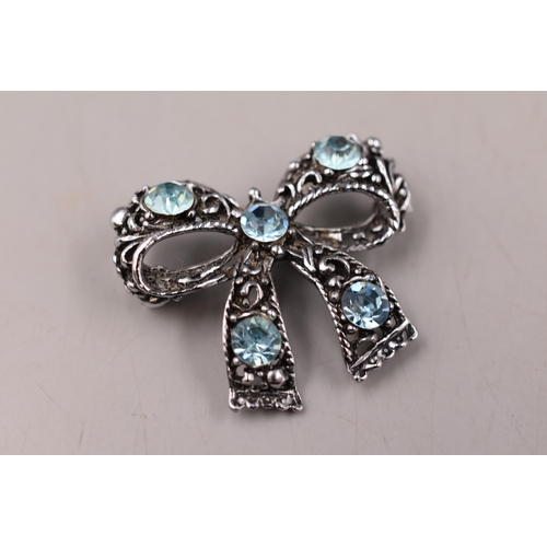 95 - Sterling Silver Bow Brooch with Turquoise Stones Complete with Presentation Box