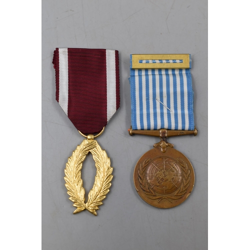 184 - United Nations Service Medal and a Belgium Order of The Golden Palms both complete with Ribbons