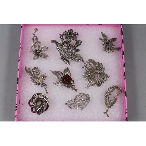 195 - A Selection of Nine Marcasite Stoned Brooches, One With Coral Flower.