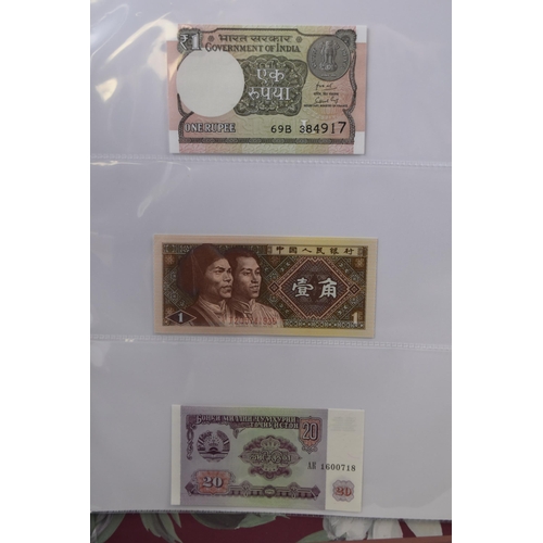 196 - Album Containing a Selection of Worldwide Bank Notes, includes Vietnam, Mongolia, Kyrgyzstan and mor... 