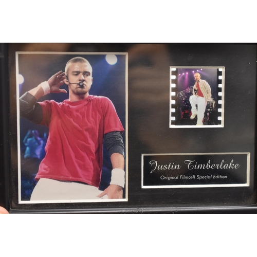 124 - A Selection of Five Framed and Glazed Film Cells of Famous People. Includes Justin Timberlake, Brad ... 