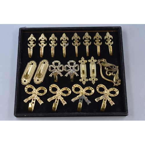 128 - A Selection of Assorted Brass Furniture Fittings.