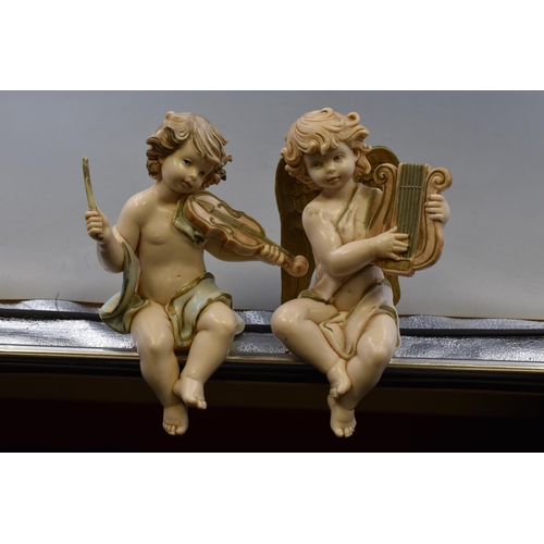 267 - Pair of Vintage Resin Italian Cherub Piano Babies, One Missing Wings. Approx 6