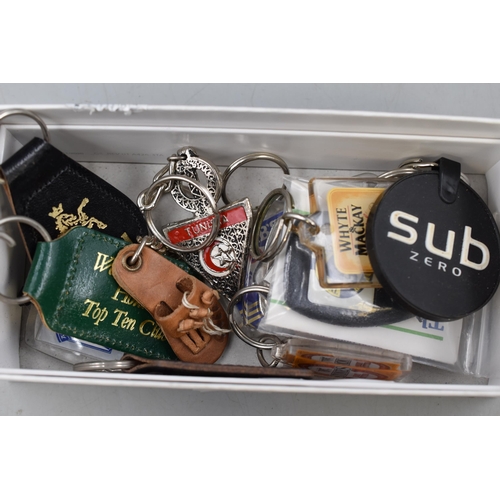 442 - A Selection of Collectable Key Rings. Includes Lamb's Rum, Tennants Gold Bier, Tunisia and More.