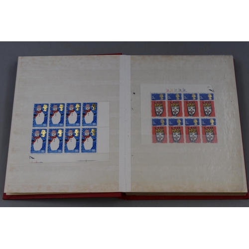 570 - Two Books Containing a Selection of Mint UK Stamps.