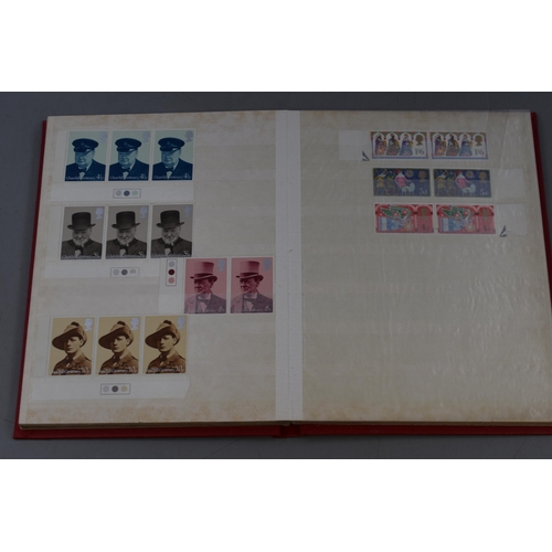 570 - Two Books Containing a Selection of Mint UK Stamps.