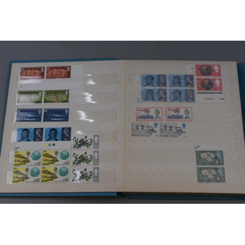 570 - Two Books Containing a Selection of Mint UK Stamps.