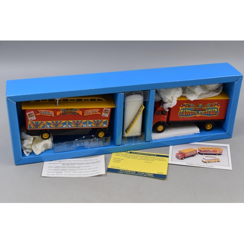 584 - A Boxed Corgi ERF Box Van Showman's Caravan VW Van 'Saddlers Famous Funfair' (31702).