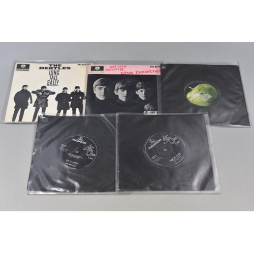 511 - A Selection of Eight Beatles Vinyl Singles and Two Beatles Vinyl EP's.