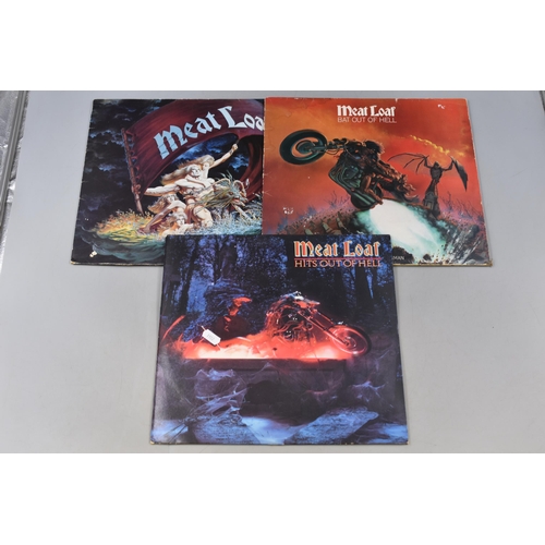 516 - A Selection of Six Vinyl LP's. Includes Meat Loaf, Eric Clapton, Status Quo and Rick Wakeman.