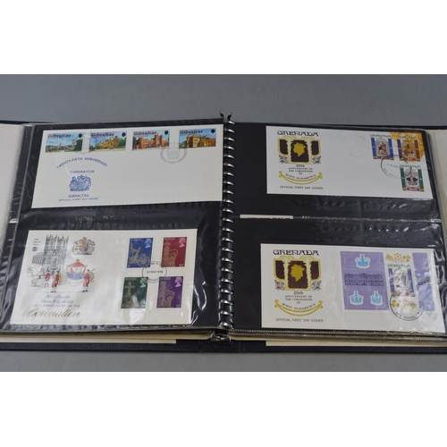 517 - A Folder Containing A Selection of Commonwealth Elizabeth II 25th Coronation Anniversary First Day C... 