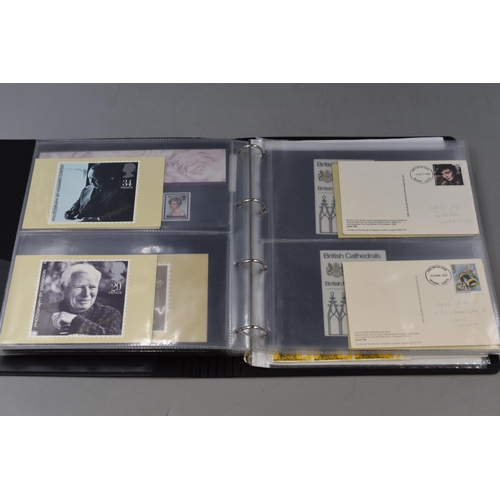 524 - A Binder Containing A Selection of Stamp Presentation Packs, Stamp Postcards and More. With A Hardba... 