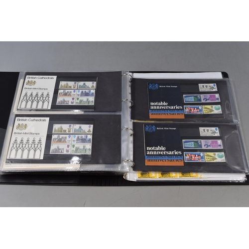 524 - A Binder Containing A Selection of Stamp Presentation Packs, Stamp Postcards and More. With A Hardba... 