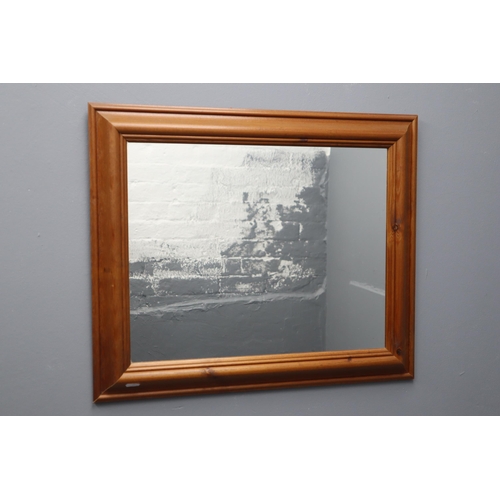 842 - Pine Framed Mirror Measures 25 x 21 Inches