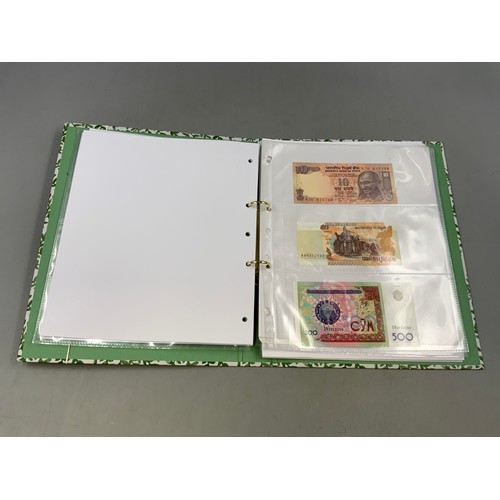 526 - Album Containing a Selection of Worldwide Bank Notes. Includes Indonesia, Venezuela, India, Uzb... 