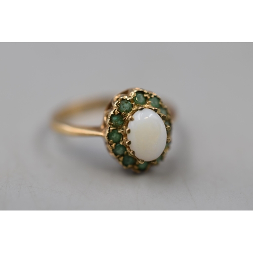 7 - A 9ct Gold Green and Opal Stoned Ring, Approx 2.1g. Size N.