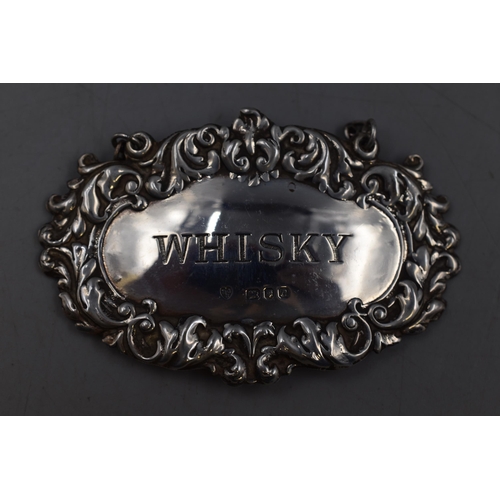 28 - A Hallmarked London Silver Whiskey Decanter Label, Circa 1968.