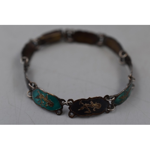 43 - A Vintage Silver Siam Enamelled Niello Dancer Panel Bracelet.