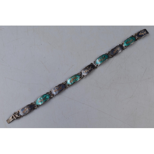 43 - A Vintage Silver Siam Enamelled Niello Dancer Panel Bracelet.