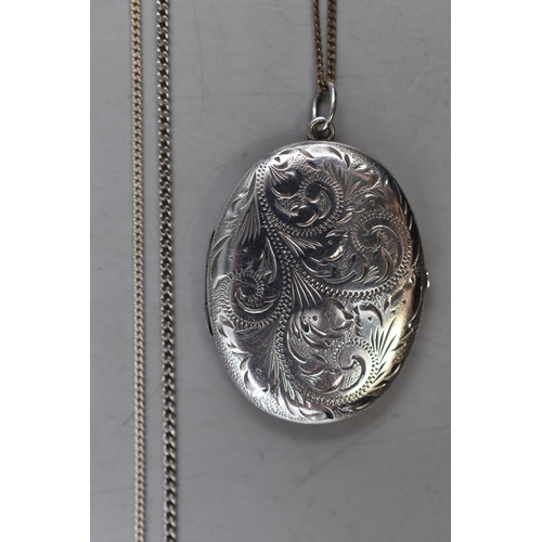 47 - An Etched Silver Locket, With Three 925. Silver Necklace Chains.