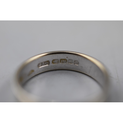 57 - An 18ct White Gold Etched Band Ring, Size L. Approx 2.89g.