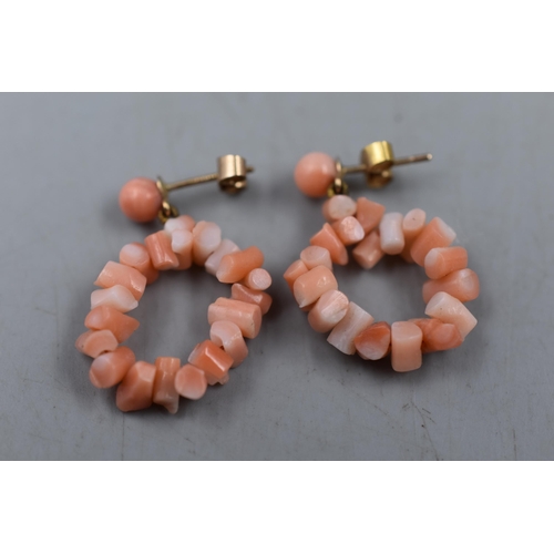 64 - A Pair of 9ct Gold Pink Coral Earrings