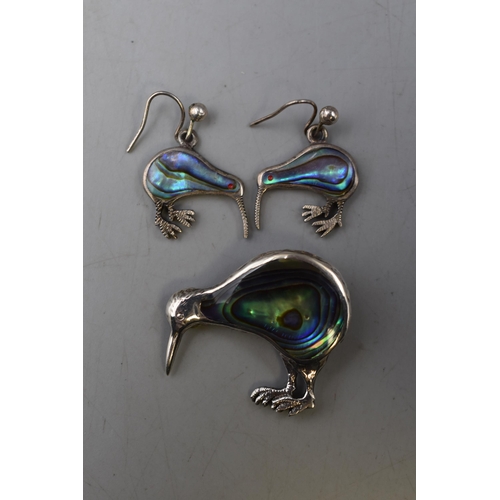 75 - A Sterling Silver and Paua Shell Kiwi Brooch, With a Pair of Matching Earrings