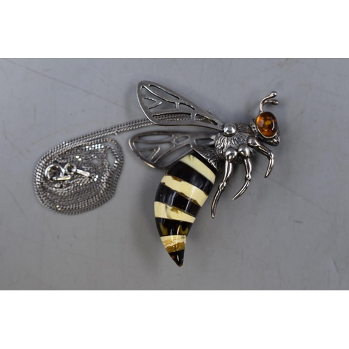 77 - A Large Sterling Silver and Baltic Amber Hornet Pendant, on 925. Silver Chain.