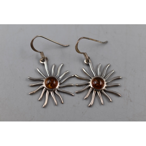 82 - A Pair of Sterling Silver Amber Stoned Sun Earrings, In Presentation Box.