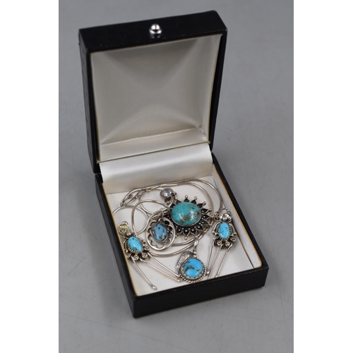 84 - A Selection of Silver and Turquoise Jewellery. Includes Pair of Earrings, Three Pendants and Silver ... 