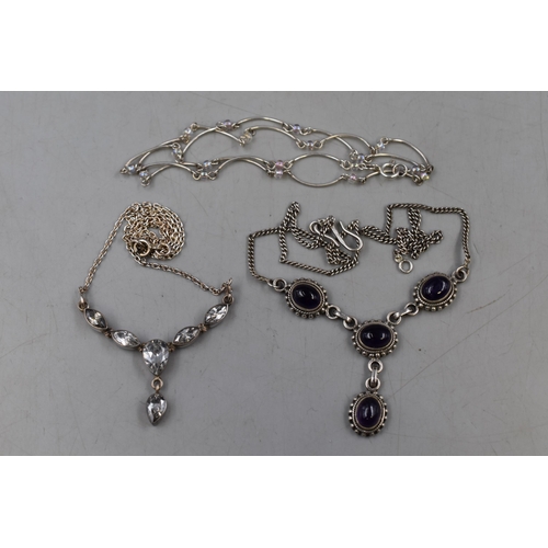 86 - Three 925. Silver Necklaces, Includes Purple Stoned, Clear Stoned and Other.