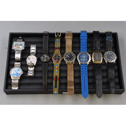 103 - A Selection of Nine Watches. Includes Sekonda, Fossil and More. One Has Broken Digital Display.