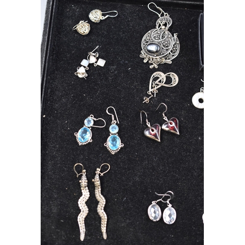 150 - Sixteen Pairs of Assorted Silver Earrings, With Two Unpaired Silver Earrings.