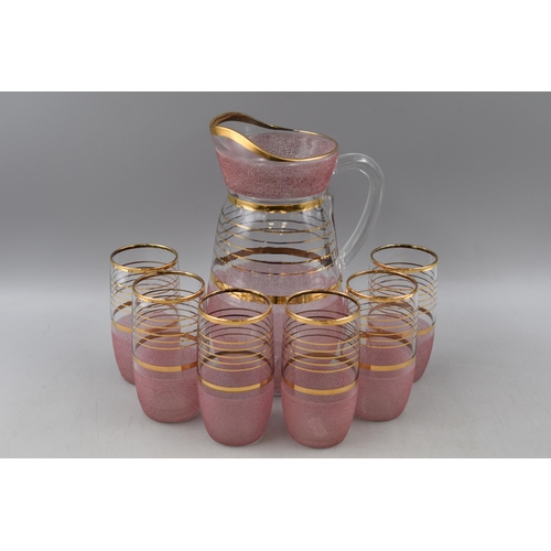 301 - Lemonade Set From the 1950s with jug and six Glasses finished with Gold Trim and Frosted Pink Glass