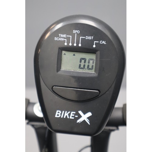 581 - Bike-X Exercise Bike with Digital Readout and Adjustable Pedal Tension Folds up for easy storage