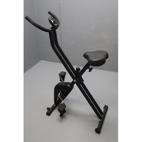 581 - Bike-X Exercise Bike with Digital Readout and Adjustable Pedal Tension Folds up for easy storage