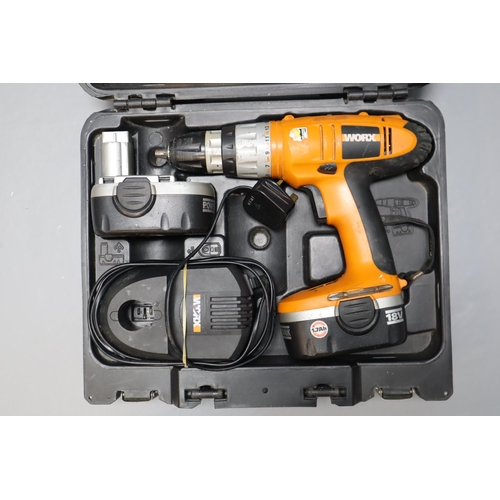 606 - Worx Cordless Drill with two batteries, Charger and a Cordless Strimmer (Working)