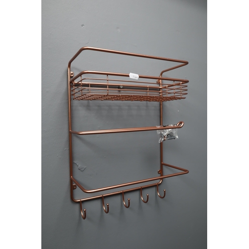 694 - A Mixed Selection To Include Copper Effect Kitchen Organiser, Boxed Clothes Rail, Boxed Three Tier S... 