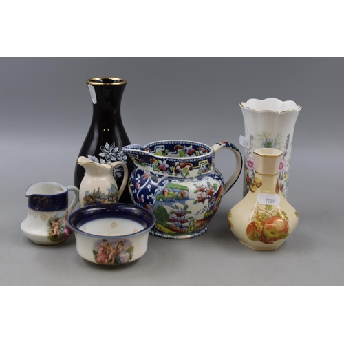 238 - A Selection of Seven Pieces of Ceramics. Includes Wade Black and Gold Bud Vase, Aynsley 'Wild Tudor'... 