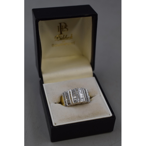 7 - Hallmarked 750 (18ct) Gold Ring Consisting of approx 1ct of Baguette and Round Diamonds (Size P) Com... 