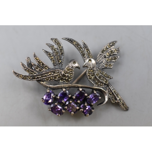 16 - A Sterling Silver Marcasite and Amethyst Stoned Brooch, Showing Two Doves on a Branch.