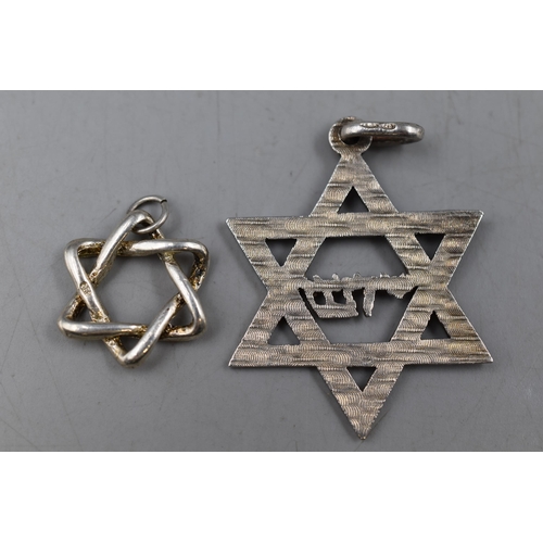 18 - Two Sterling Silver Star of David Pendants