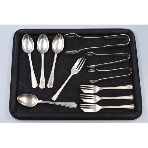 34 - A Selection of Silver Plated Cutlery, To Include Three Vintage Sugar Tongs, Dessert Forks and Spoons... 