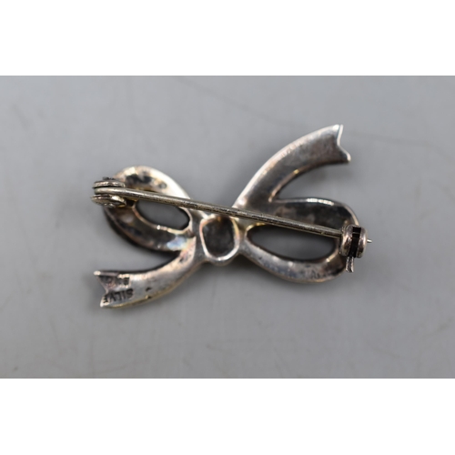 43 - A 1930's Silver Marcasite Stoned Bow Brooch