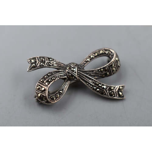 43 - A 1930's Silver Marcasite Stoned Bow Brooch