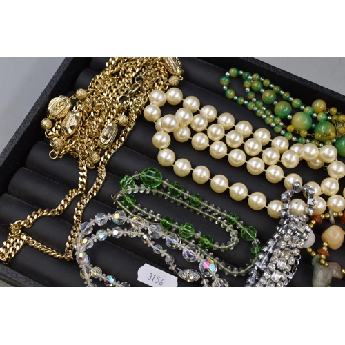 64 - A Selection of Vintage Jewellery. Includes Beaded Jewellery, Necklace and Earring Sets and More.