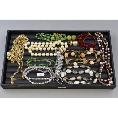 64 - A Selection of Vintage Jewellery. Includes Beaded Jewellery, Necklace and Earring Sets and More.