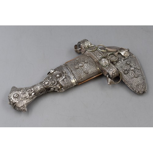 68 - An Antique Ornate Omani Khanjar Dagger with Unmarked Silver Mounted Sheath and Handle, Camel Skin Ba... 