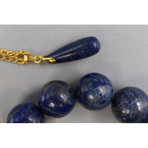 72 - A Lapis Lazuli Beaded Bracelet With Lapis Lazuli Drop Pendant on Chain