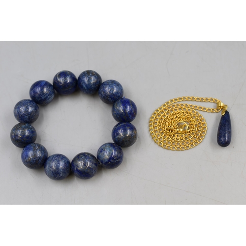 72 - A Lapis Lazuli Beaded Bracelet With Lapis Lazuli Drop Pendant on Chain